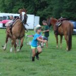 Addie running with horse 2015